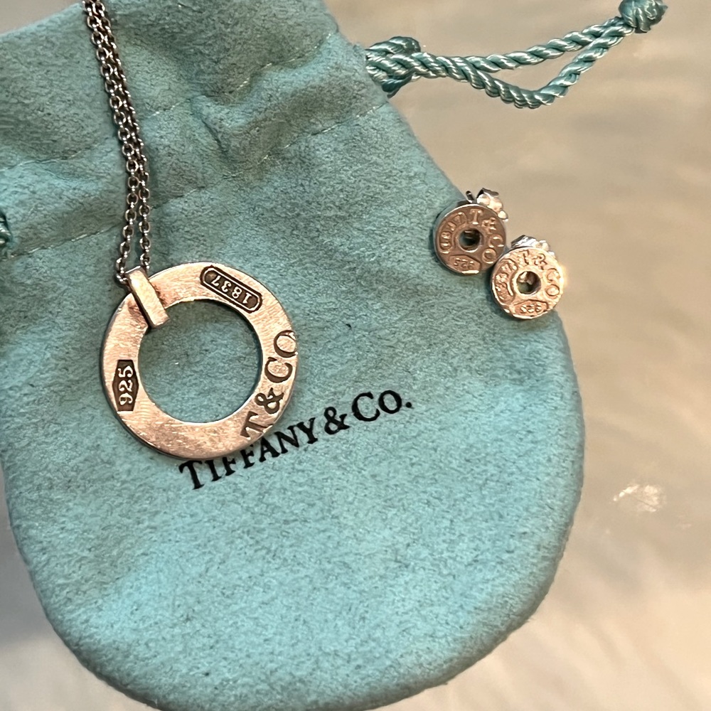 Tiffany & Co sterling silver (925 stamped) matching necklace and earrings set.